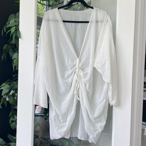 White bathing suit cover up with long sleeves